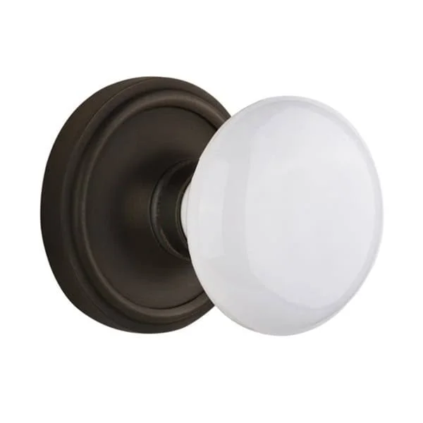 Nostalgic Warehouse 704847 Classic Rosette Single Dummy White Porcelain Door Knob - Oil-Rubbed Bronze